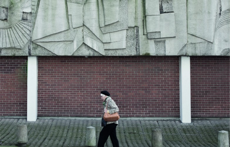 Woman is walking in the streets of Sheffield